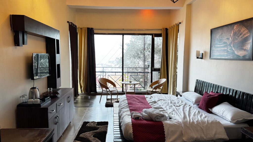 Couple friendly BnB in Bhimtal with cozy bedroom and balcony